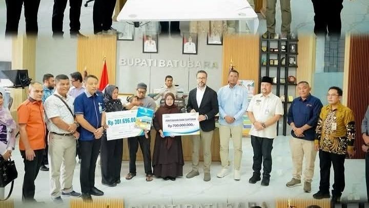 Oplus_0 Tiga Keluarga Korban Kebakaran PT Evyap KEK Sei Mangkei Terima Santunan Rp 3,2 Miliar